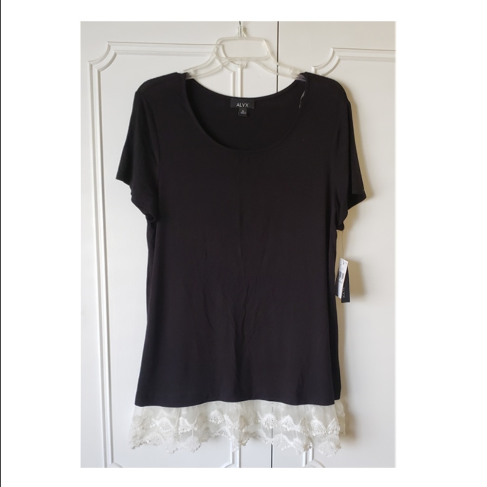 Short sleeved black tunic top with lace at bottom
